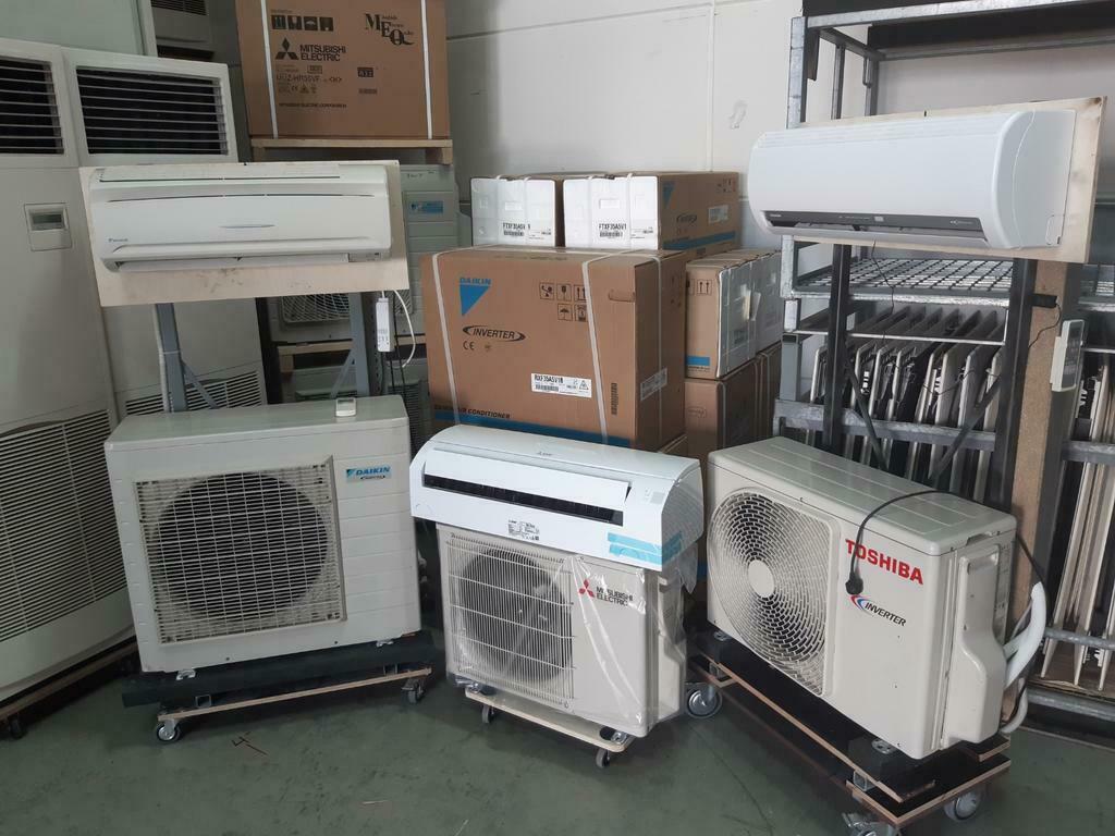 Nieuwe en gebruikte airco setjes werkend te zien, Ophalen