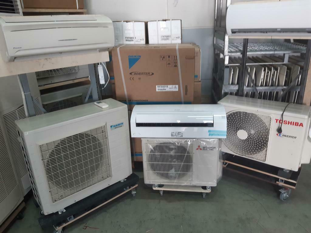 Nieuwe en gebruikte airco setjes werkend te zien, Ophalen