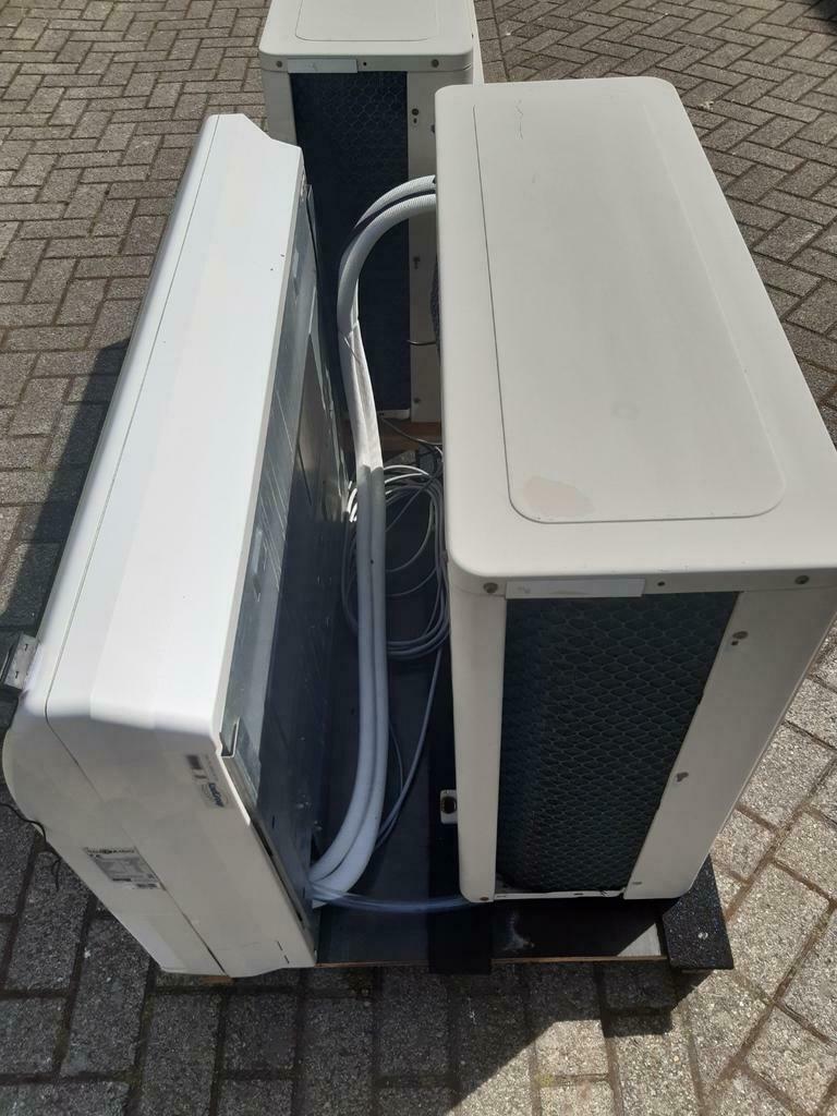 Nieuwe en gebruikte airco setjes werkend te zien, Ophalen