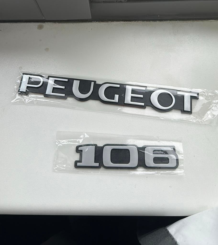 Peugeot 106 phase 1 embleem nieuwstaat, Ophalen of Verzenden, Nieuw, Peugeot