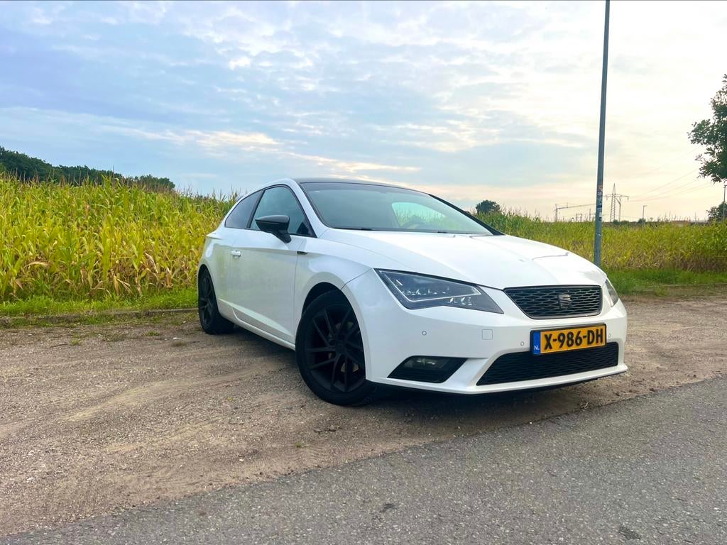 SEAT Leon SC FR 1.2 TSI DSG 2014, Auto's, Seat, 4 cilinders, Leon, Wit, Stationwagon