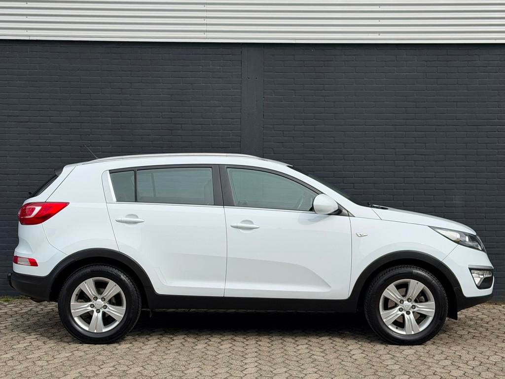 Kia Sportage 1.6 GDI ComfortLine AIRCO CRUISE TREKHAAK WINTE, Voorwielaandrijving, Euro 5, 4 cilinders, Wit