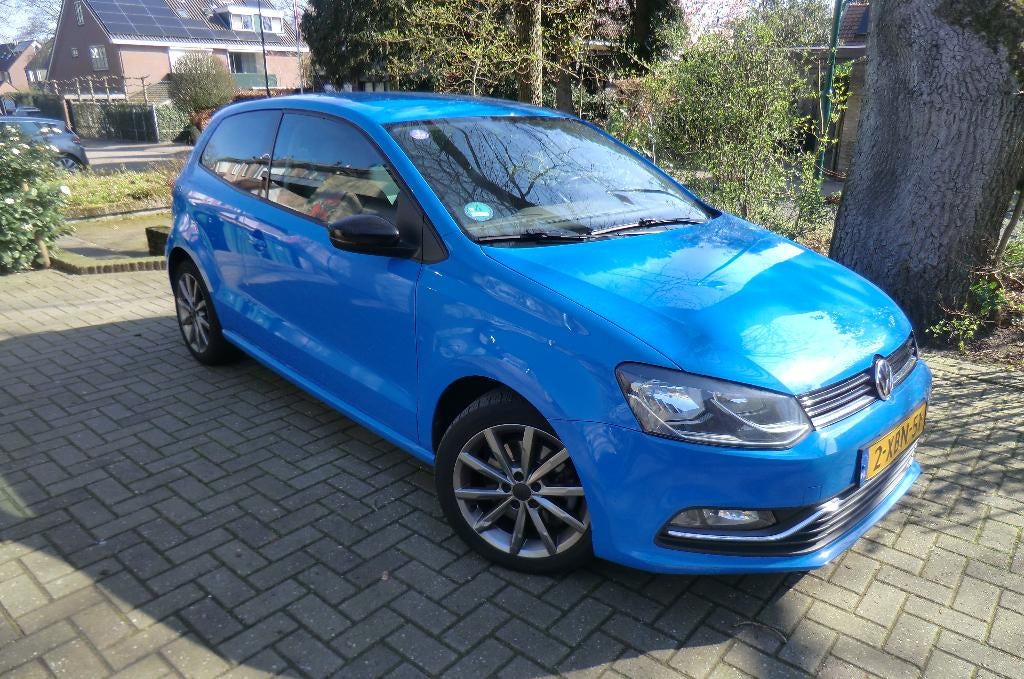 Volkswagen Polo 1.2 TSI Comfort line 2014 Blauw, Auto's, Voorwielaandrijving, Stof, 1295 kg, 4 cilinders