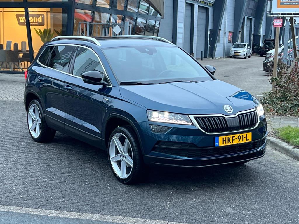 Skoda KAROQ 1.5 TSI ACT DSG-7 125 YEARS EDITION LED NAVI!, Stof, 4 cilinders, 150 pk, Blauw
