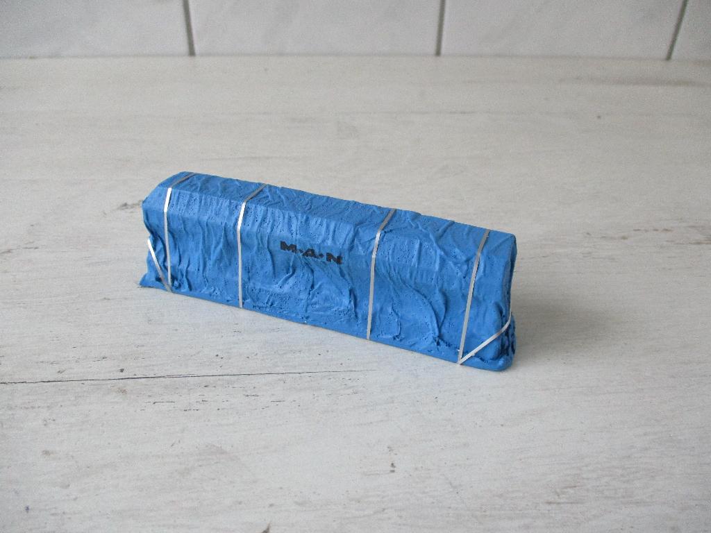 Heico  M.A.N. Scheepsdiesel Afdekzeil Schaal 1:87, Hobby en Vrije tijd, Modelauto's | 1:87, Zo goed als nieuw, Bus of Vrachtwagen