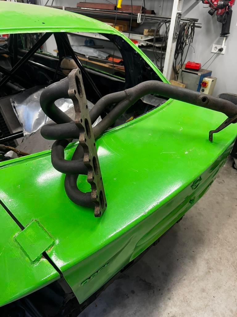 Uitlaat spruitstuk opel c20xe, Ophalen