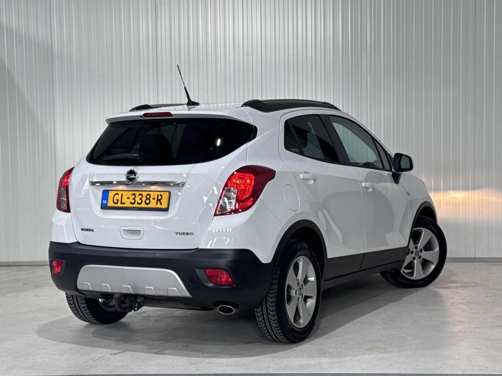Opel Mokka 1.4 T Cosmo|TREKHAAK|NAVI|CRUISE|PDC, Voorwielaandrijving, Gebruikt, 4 cilinders, Met garantie (alle)