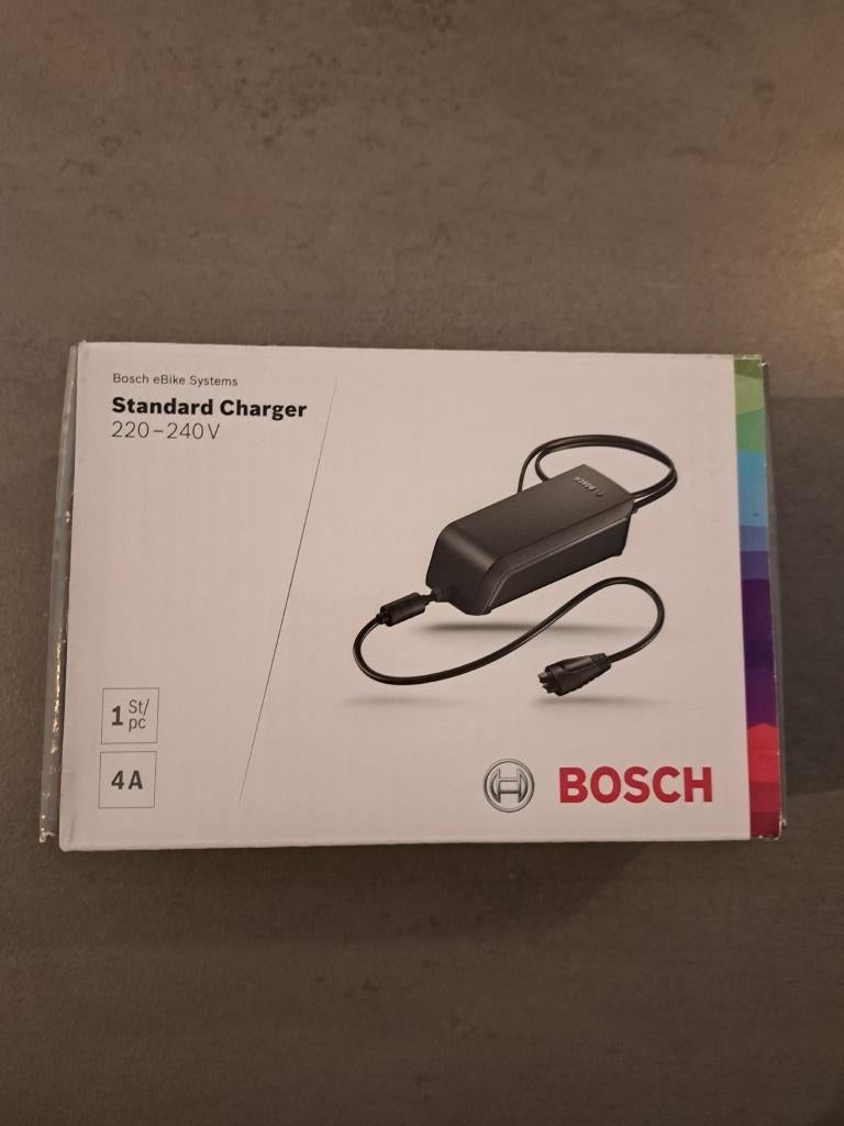 Bosch acculader 4A voor e-bike, Ophalen, Zo goed als nieuw