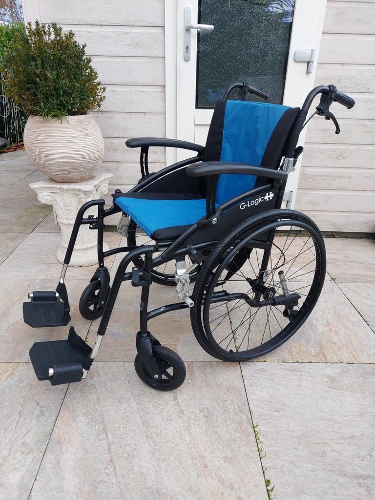 G logic  en g lite pro  lichtgewicht rolstoel, Ophalen of Verzenden, Zo goed als nieuw, Duwrolstoel