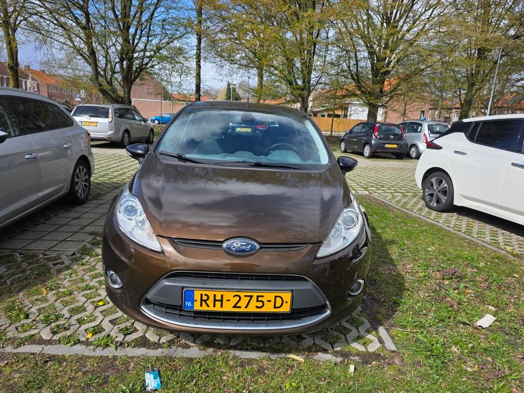 Ford Fiësta 1.25 60KW 5DR 2011 Bruin, Voorwielaandrijving, 1242 cc, Bruin, Stoelverwarming