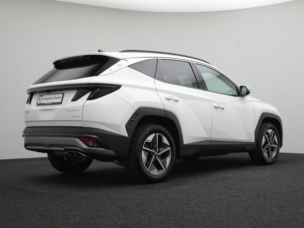 Hyundai Tucson 1.6 T-GDI HEV Comfort | Stoelverwarming | Nav, 12 maanden, Stof, Gebruikt, 4 cilinders