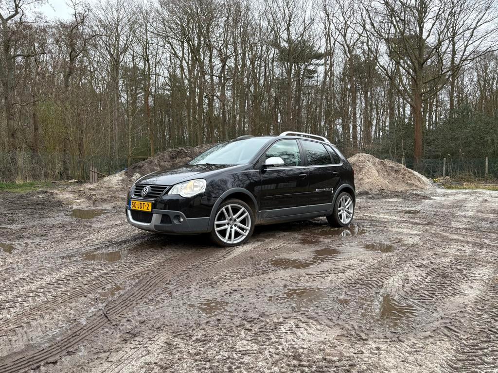 Volkswagen Polo 1.6 77KW Cross AUT 2009 Zwart, Stof, 1112 kg, 4 cilinders, USB