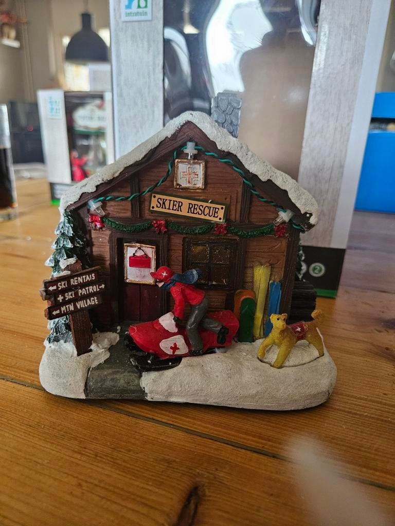 Sneeuwscooter ehbo post kerstdorp, Ophalen