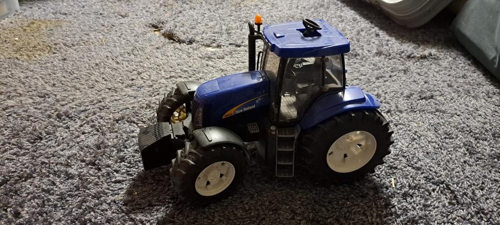 Bruder New Holland T7070 Tractor Model - Blauw, Hobby en Vrije tijd, Modelbouw | Auto's en Voertuigen, Zo goed als nieuw, Overige typen