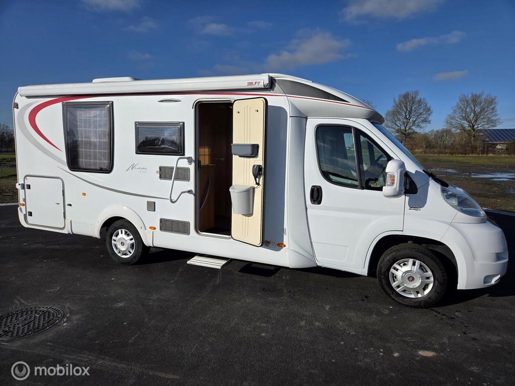 Bürstner Nexxo T687 2010 Queensbed☆2x airco, Solar, 131pk, Caravans en Kamperen, Campers, Afzuigkap, Luifel, Bedrijf, Bürstner