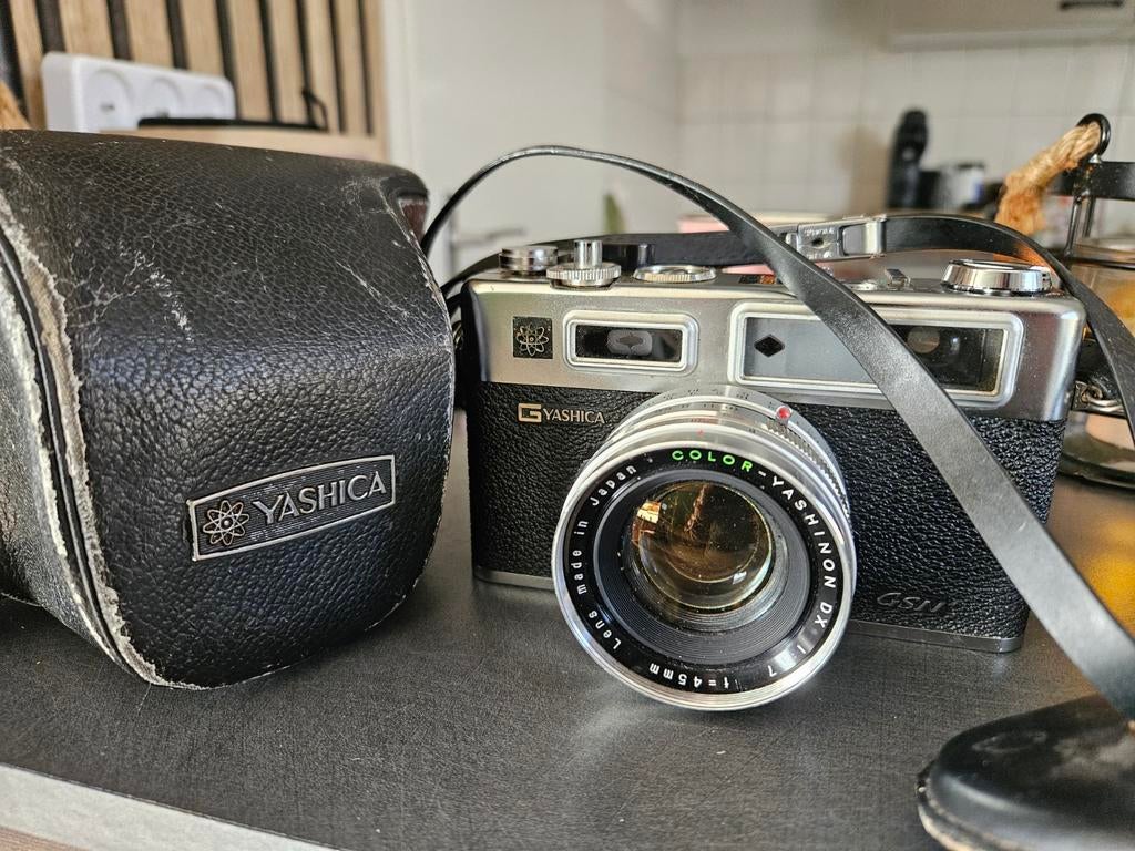 Te koop: Yashica Electro 35 met originele beschermhoes, Audio, Tv en Foto, Fotocamera's Analoog, Ophalen of Verzenden, Compact