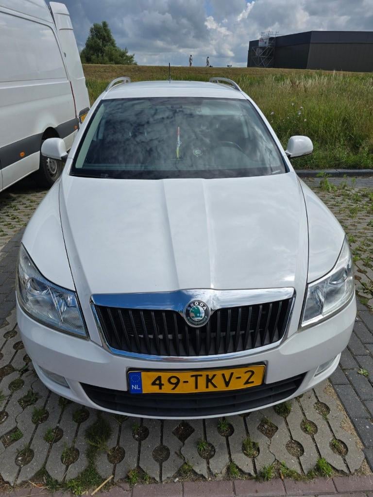 Skoda Octavia 1.4 TSI 90KW Combi 2012 Wit, Auto's, Voorwielaandrijving, Stof, 4 cilinders, Electronic Stability Program (ESP)