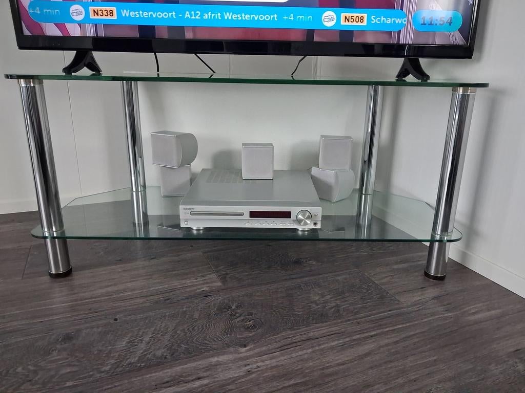 Glazen tv meubel met rvs poten, Huis en Inrichting, Tafels | Sidetables, Ophalen, 25 tot 50 cm, Rechthoekig, Glas