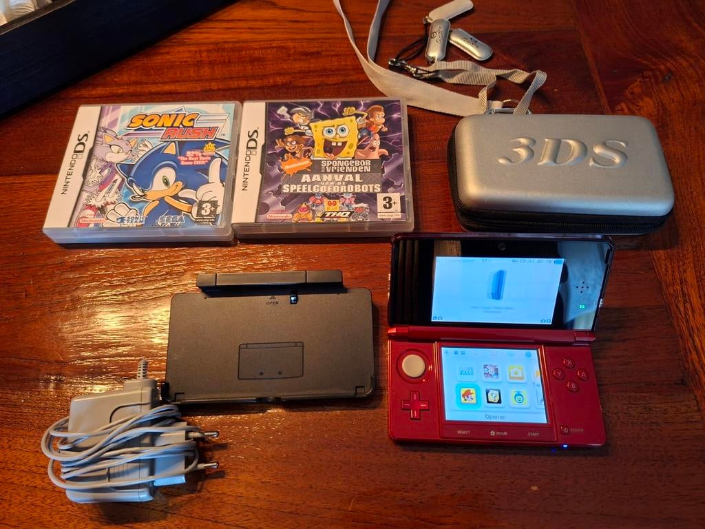 Nintendo DS met 5 spellen en toebehoren, Ophalen of Verzenden, Zo goed als nieuw, DS Lite