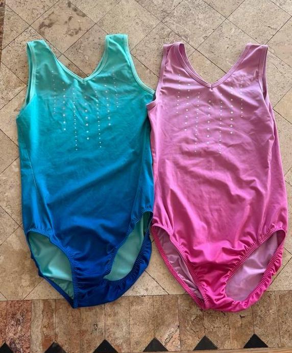 Turn acro pakjes maat 134 140 roze en blauw, Sport en Fitness, Kindermaat 122 t/m 140, Ophalen of Verzenden, Zo goed als nieuw