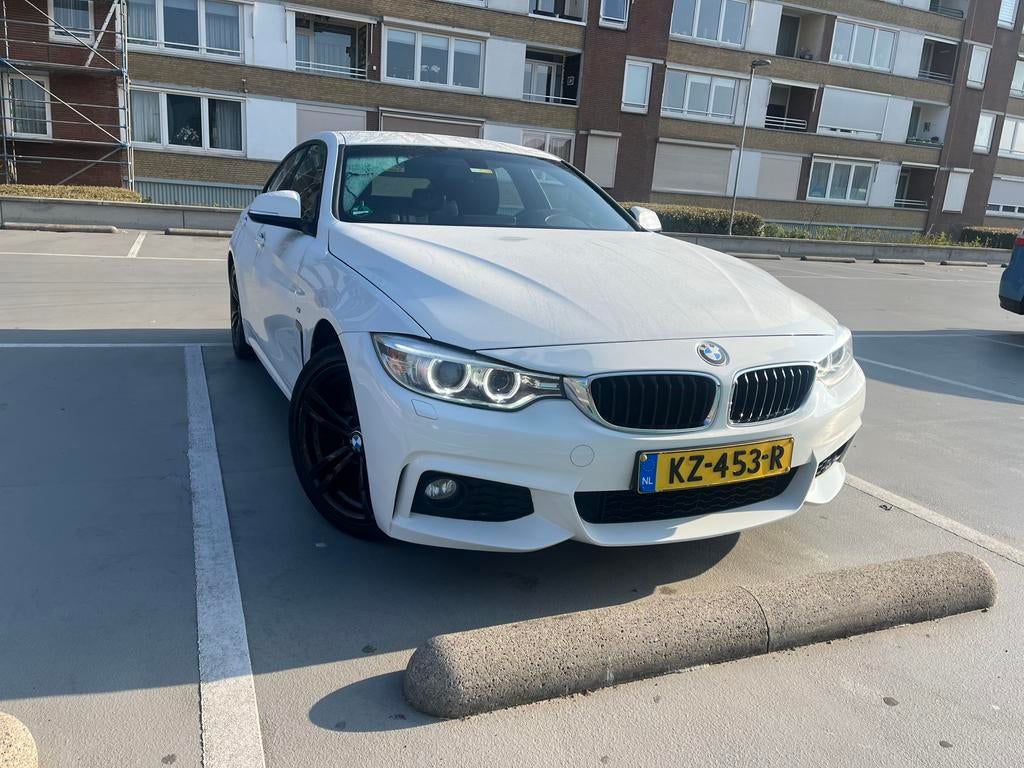 BMW 420i Gran Coupé M Sport AUT 2017 Leer Navi, Auto's, BMW, 1998 cc, Achterwielaandrijving, Zwart, Wit