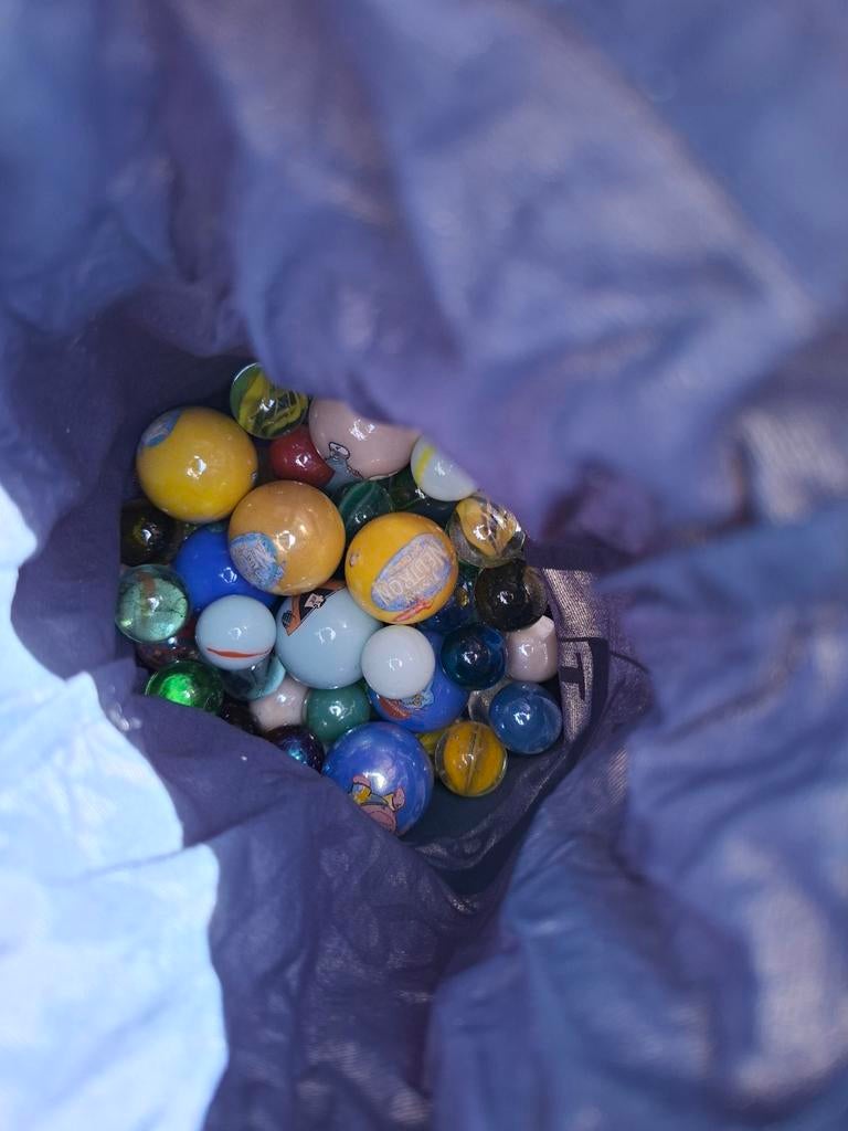 Zak met verschillende knikkers, Ophalen of Verzenden