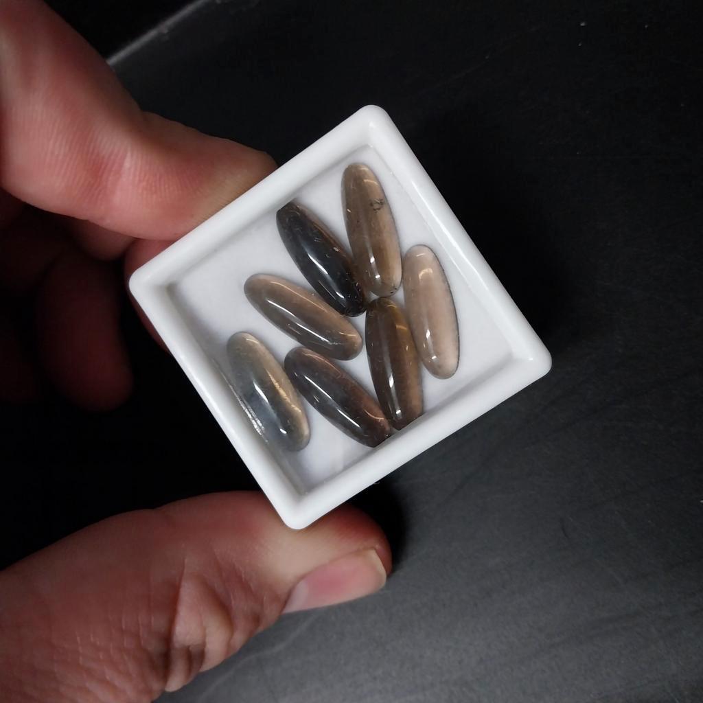 Lot met langwerpige rookkwarts cabochons, Ophalen of Verzenden