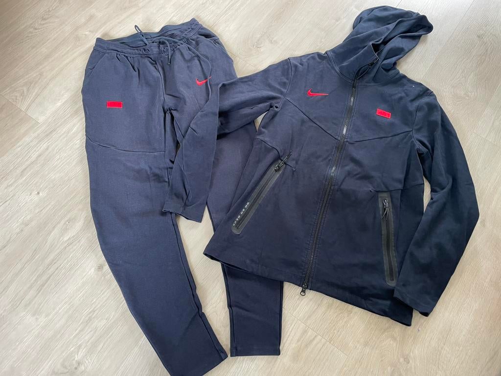 Nike tech fleece trainingspak donker blauw, frans elftal, Blauw, Ophalen of Verzenden, Zo goed als nieuw, Algemeen