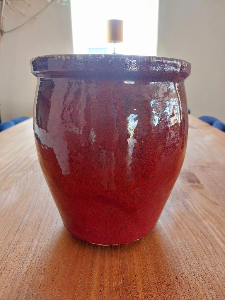 geëmailleerde bloempot, Ophalen