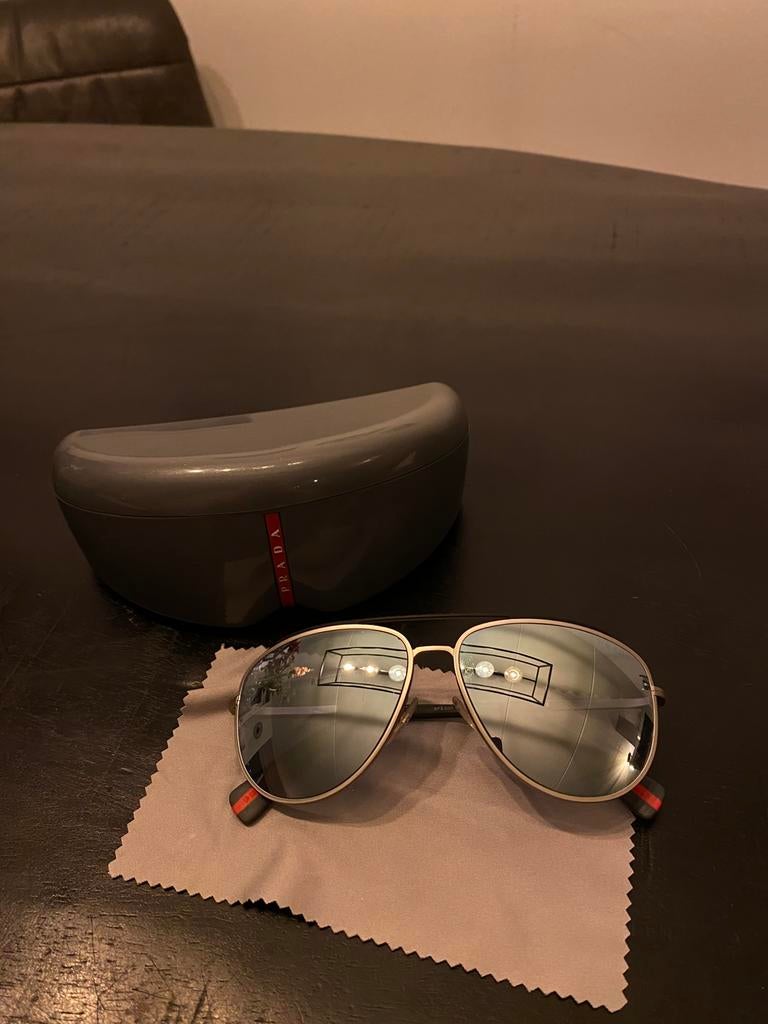 Prada Sport zonnebril, Ophalen of Verzenden, Zo goed als nieuw, Zwart, Overige merken