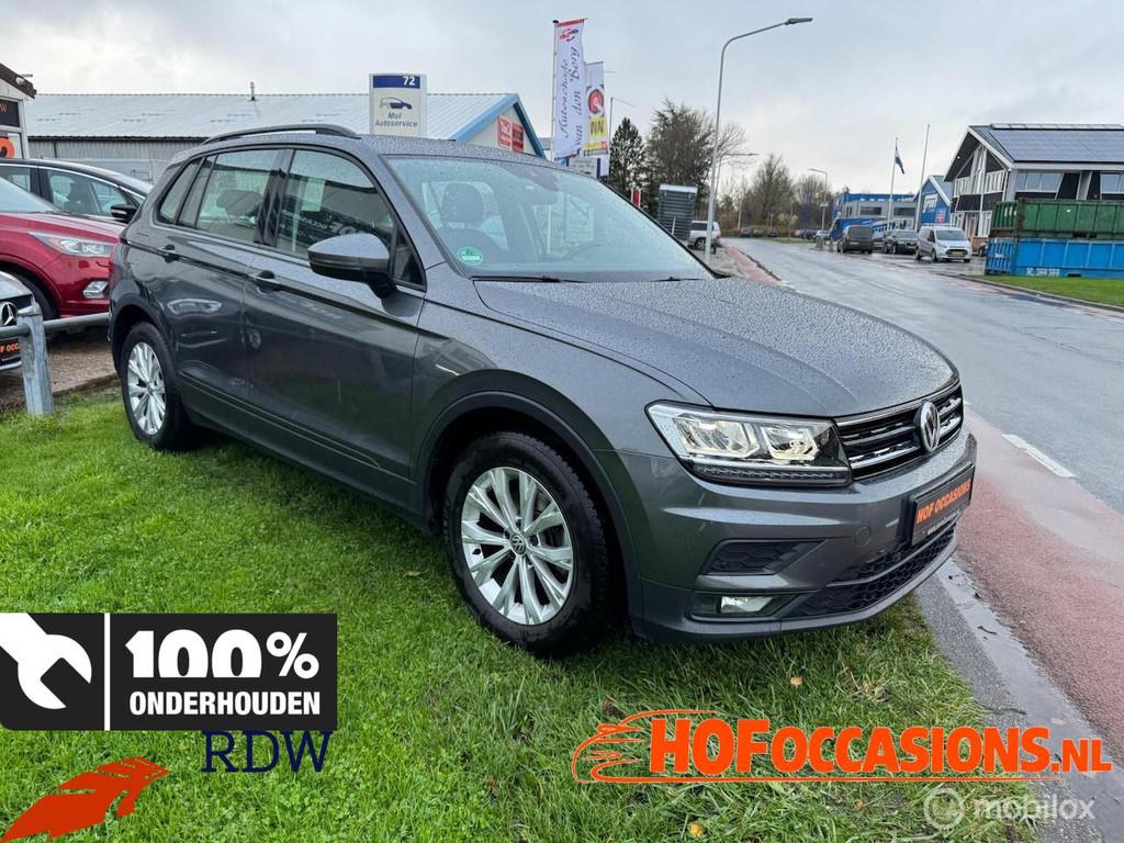 Volkswagen Tiguan 1.5 TSI Comfortline 150pk NAVI/PDC/STOELVE, Auto's, Voorwielaandrijving, Stof, Zwart, 4 cilinders