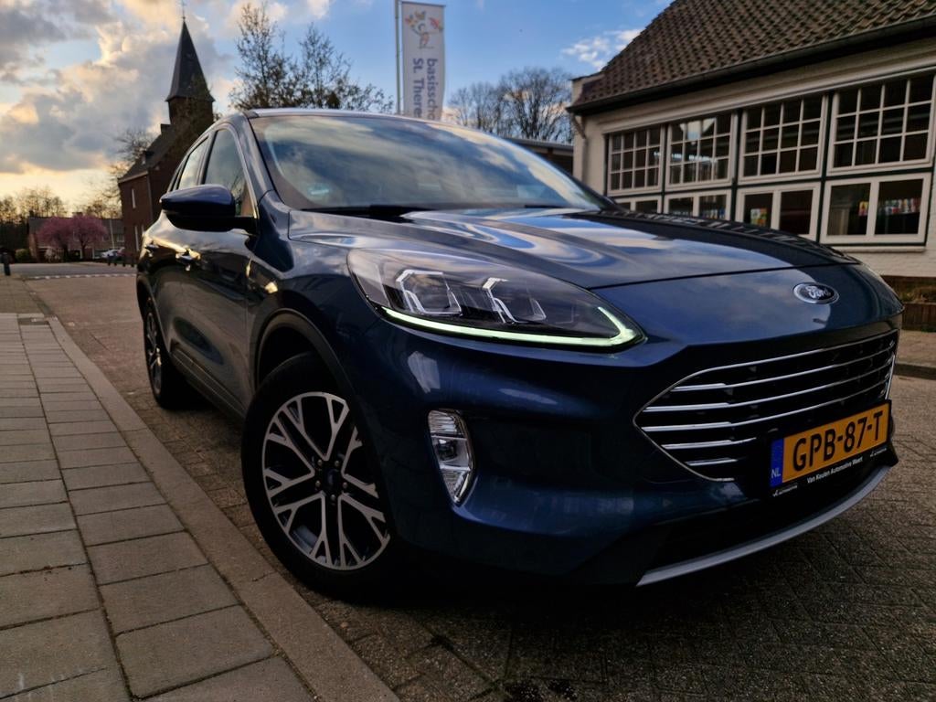 Ford Kuga 2.5 PHEV Titanium Winter-Assist.-&Technology Pack, Stof, Blauw, SUV of Terreinwagen, Te koop