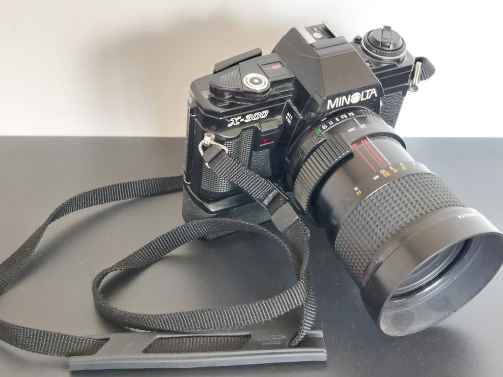 Minolta x300 black + MD 35-70mm 3.5 macro en Winder., Ophalen of Verzenden