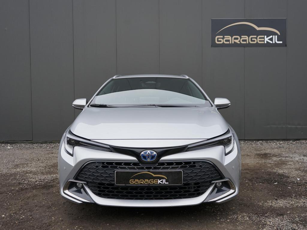 Toyota Corolla Touring Sports Hybrid 140 Dynamic Team D / Fa, Gebruikt, 4 cilinders, Origineel Nederlands, Hybride Elektrisch/Benzine