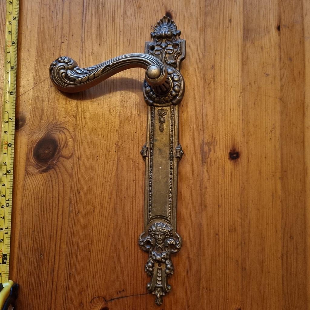 Antieke sierlijke koperen/messing deurkruk, Antiek en Kunst, Ophalen