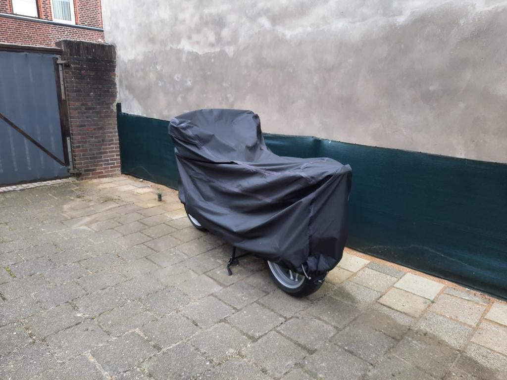 Motorstalling, Ophalen, Zo goed als nieuw