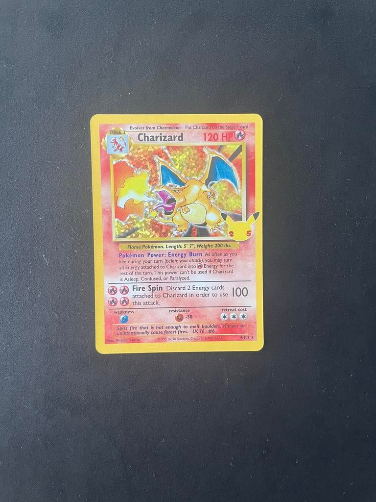Charizard celebrations mint, Ophalen of Verzenden, Nieuw, Losse kaart, Foil