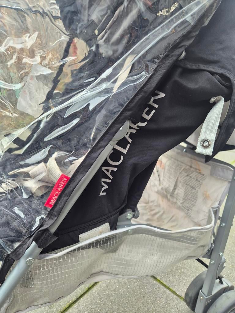 Maclaren buggy met regenhoes, Ophalen