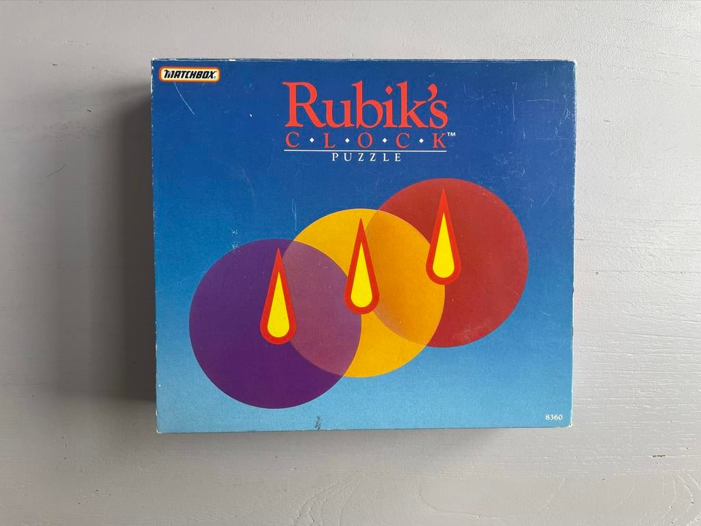Rubik's Clock Puzzle (in originele verpakking), Een of twee spelers, Ophalen of Verzenden, Zo goed als nieuw