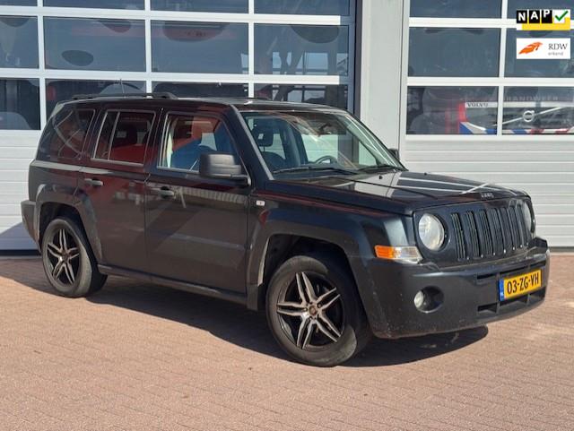 Jeep Patriot 2.4 Limited 4X4 - Trekhaak - Carplay - Leder, Auto's, Jeep, 450 kg, Gebruikt, Zwart, 4 cilinders