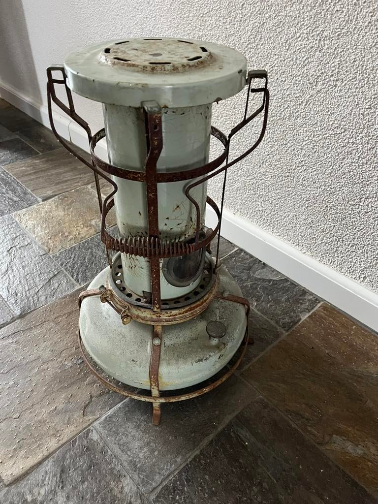 Oude petroleumkachel, Ophalen