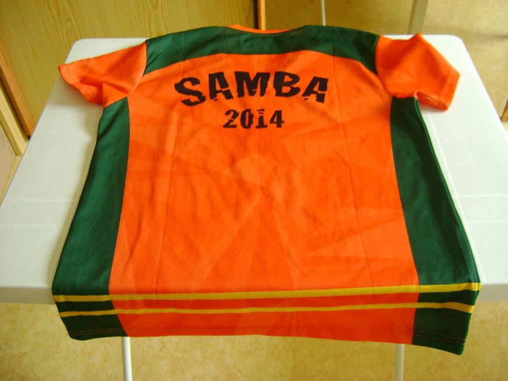 oranje/groen heineken shirt mt l uit 2014 samba, Verzamelen, Ophalen of Verzenden, Zo goed als nieuw, Kleding, Heineken