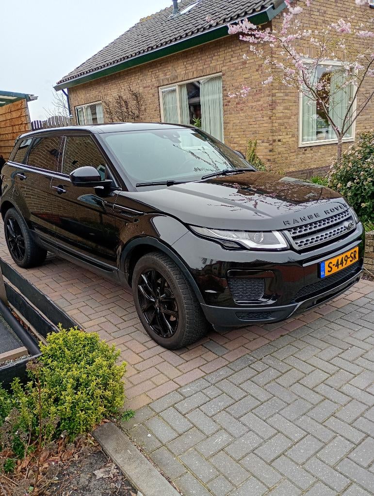 Land Rover Range Rover Evoque 2.0 SI4 4WD AUT 2016 Zwart, 1800 kg, Zwart, 4 cilinders, Leder en Stof