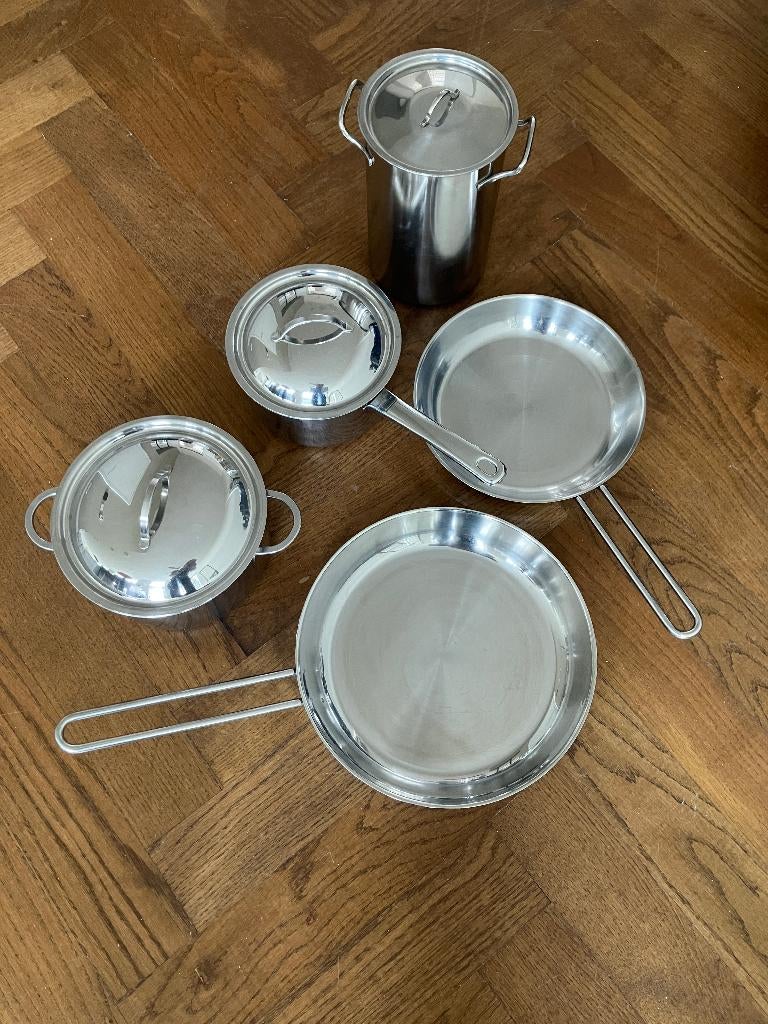 Diverse RVS Eva Trio en Spring steel- en (koeken)pannen, Ophalen, Gebruikt, Keramische plaat, Pannenset