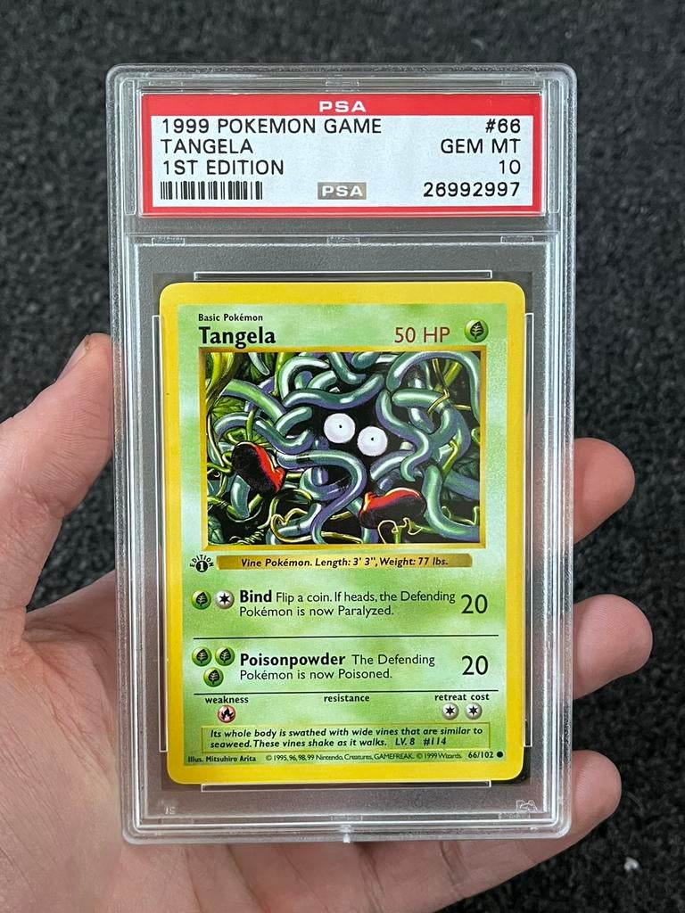 Pokémon PSA 10 1st edition Tangela #66 Base set, Ophalen of Verzenden, Zo goed als nieuw, Losse kaart, Foil