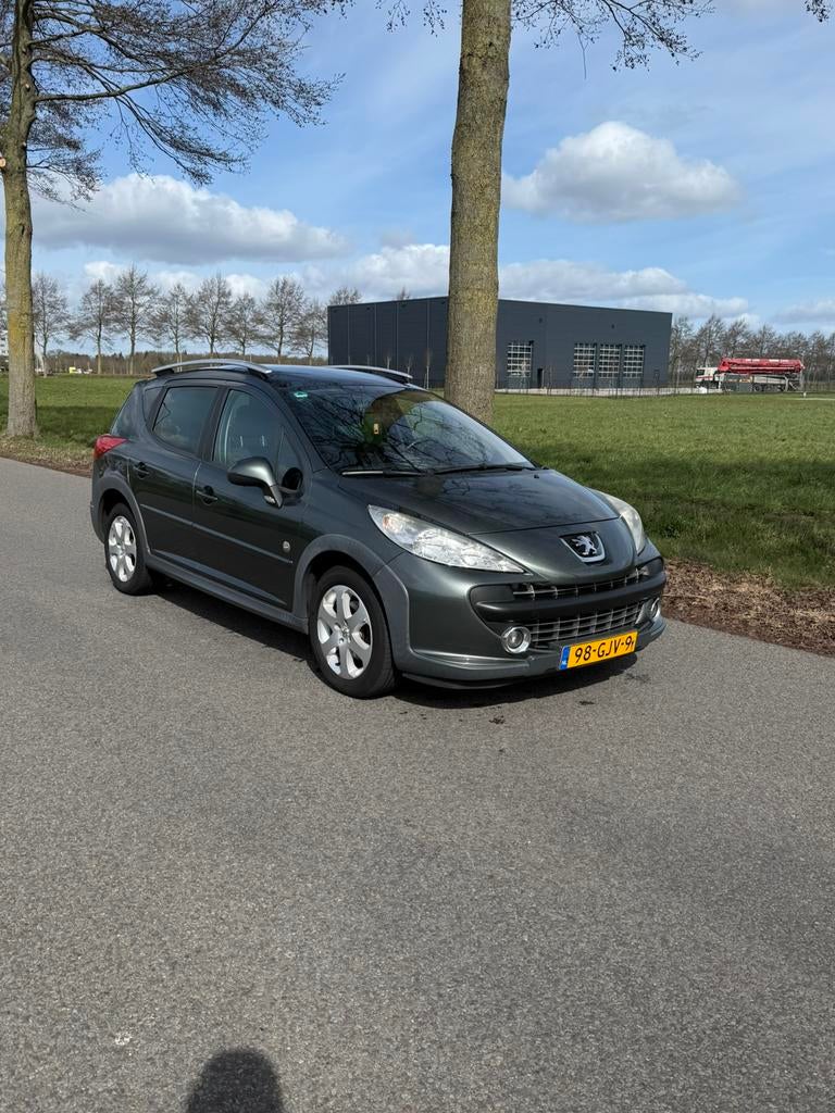 Peugeot 207 1.6 16V SW Outdoor 2008 Grijs, Zwart, 4 cilinders, Leder en Stof, 1110 kg