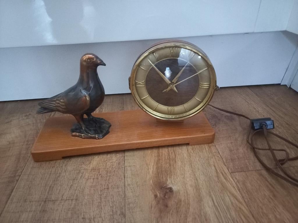 Vintage electrisch klokje, Ophalen