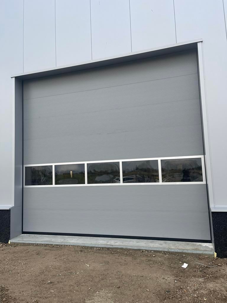 Alle maten en kleuren nieuwe garagedeur, roldeur, deuren NL, Ophalen of Verzenden, 120 cm of meer, 215 cm of meer, Garagedeur