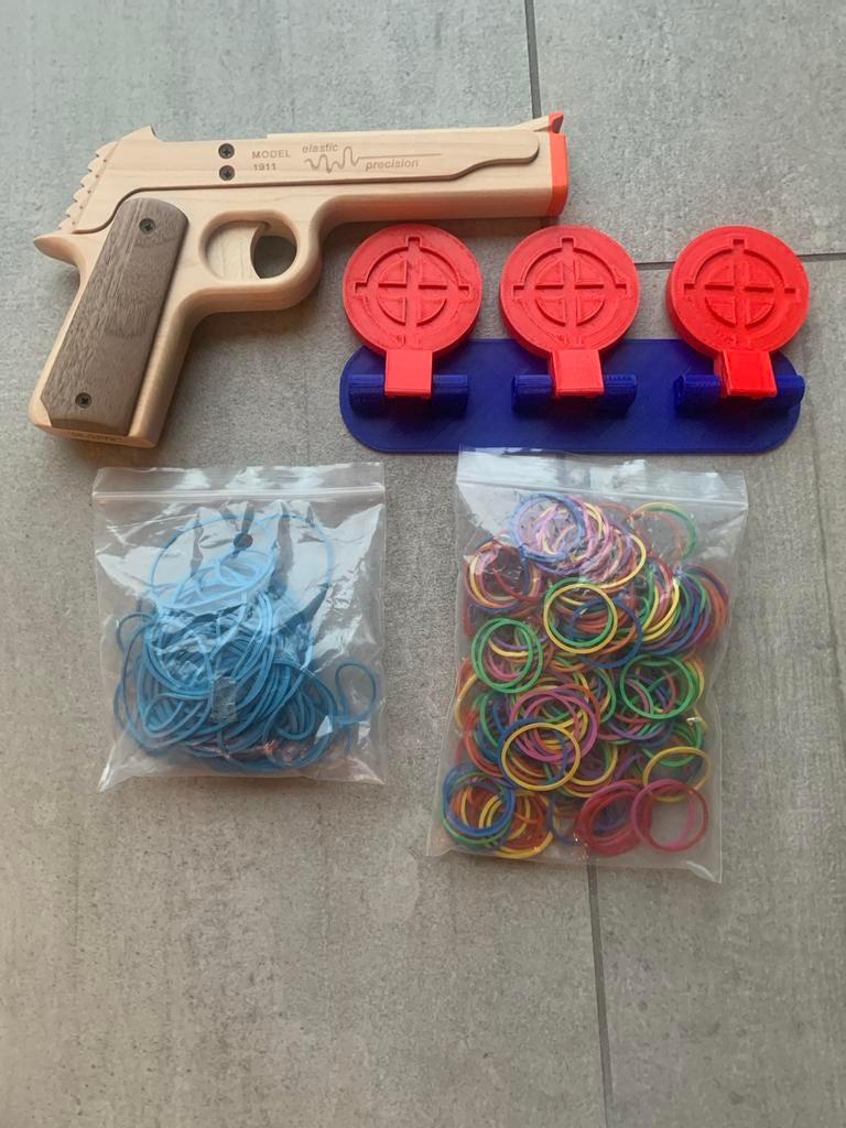 Houten speelgoed pistool met elastiekjes en targets, Ophalen of Verzenden, Zo goed als nieuw