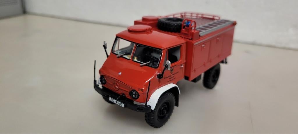 Minichamps MB Unimog 404.TLF8 Feuerwehr Aachen, Hobby en Vrije tijd, Modelauto's | 1:43, Ophalen of Verzenden, Zo goed als nieuw
